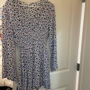 En creme mini dress, from a small boutique